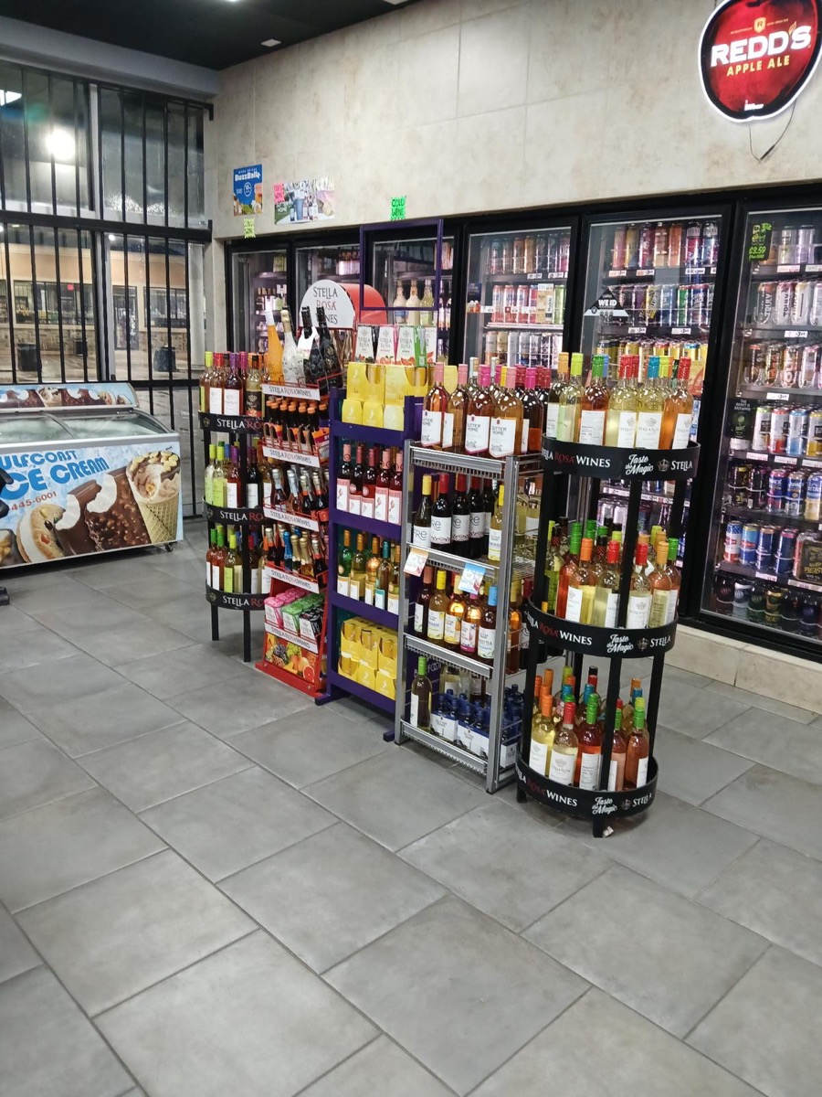 Express 64 extensive beer and wine cooler section with variety of brands and styles
